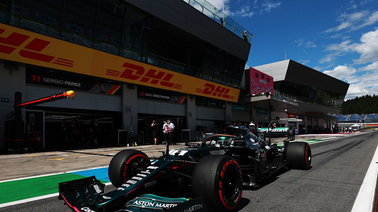 SPIELBERG, AUSTRIA - JUNE 26: Lance Stroll of Canada driving the (18) Aston Martin AMR21 Mercedes in the Pitlane during qualifying ahead of the F1 Grand Prix of Styria at Red Bull Ring on June 26, 2021 in Spielberg, Austria. (Photo by Mark Thompson/Getty Images)