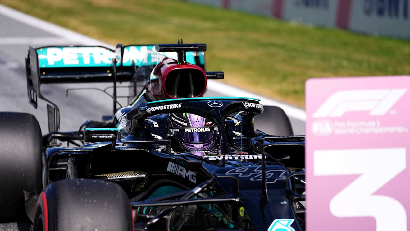 SPIELBERG, AUSTRIA - JUNE 26: Third place qualifier Lewis Hamilton of Great Britain and Mercedes GP stops in parc ferme during qualifying ahead of the F1 Grand Prix of Styria at Red Bull Ring on June 26, 2021 in Spielberg, Austria. (Photo by Darko Vojinovic - Pool/Getty Images)