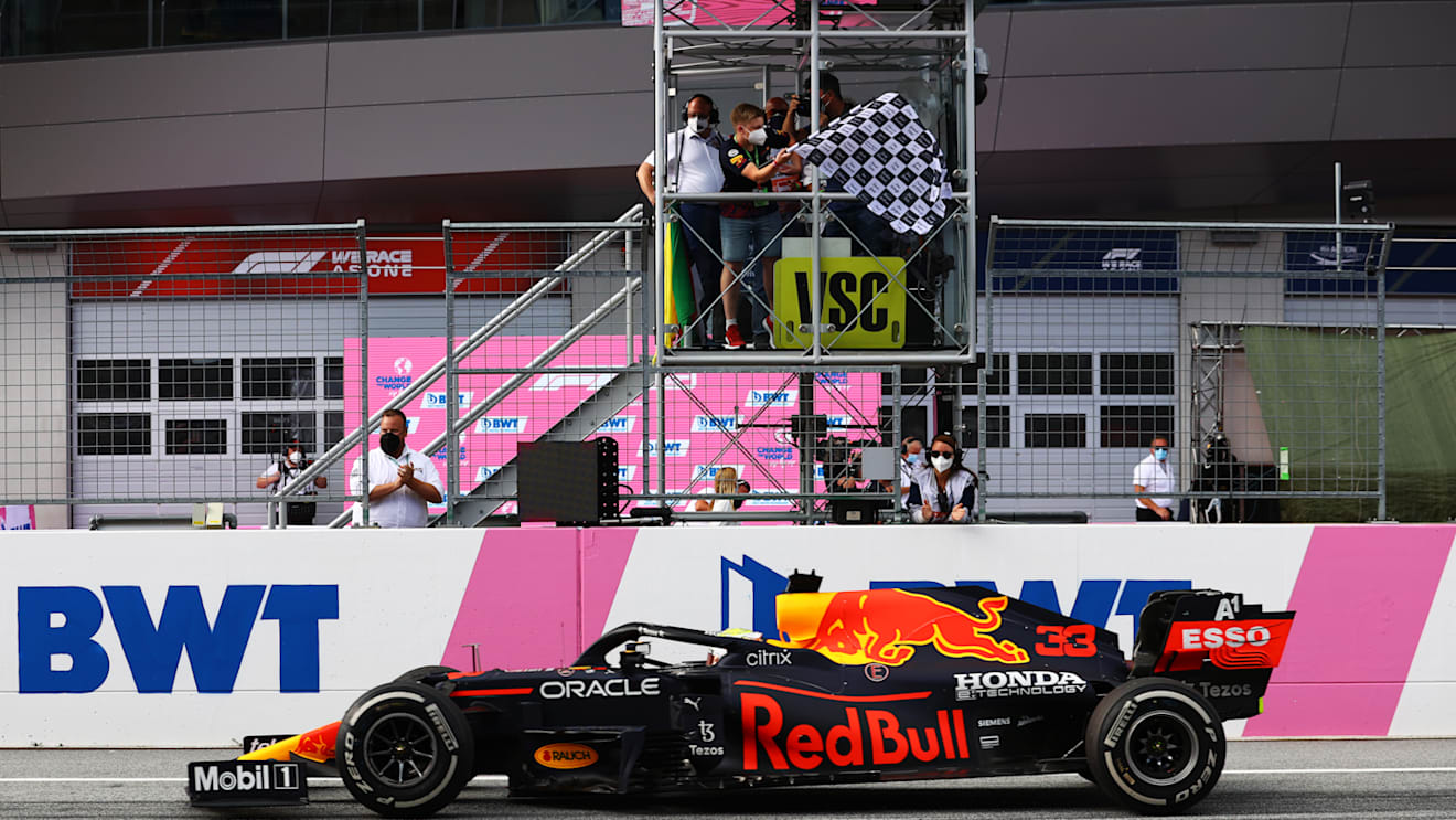 SPIELBERG, AUSTRIA - JUNE 27: Race winner Max Verstappen of the Netherlands driving the (33) Red Bull Racing RB16B Honda takes the chequered flag during the F1 Grand Prix of Styria at Red Bull Ring on June 27, 2021 in Spielberg, Austria. (Photo by Bryn Lennon/Getty Images)