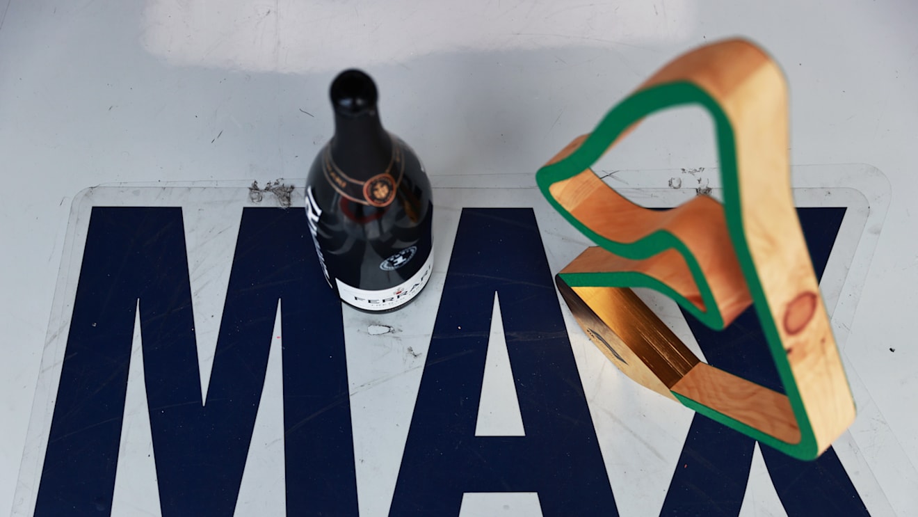 SPIELBERG, AUSTRIA - JUNE 27: The race winners trophies and sparkling wine of Max Verstappen of Netherlands and Red Bull Racing are pictured in the garage after the F1 Grand Prix of Styria at Red Bull Ring on June 27, 2021 in Spielberg, Austria. (Photo by Mark Thompson/Getty Images)