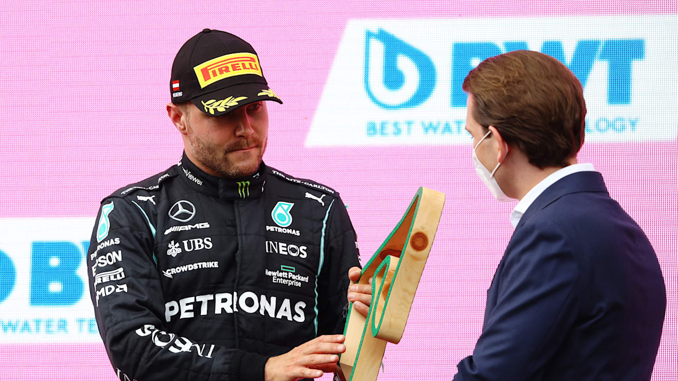 SPIELBERG, AUSTRIA - JUNE 27: Third placed Valtteri Bottas of Finland and Mercedes GP celebrates on the podium during the F1 Grand Prix of Styria at Red Bull Ring on June 27, 2021 in Spielberg, Austria. (Photo by Bryn Lennon/Getty Images)