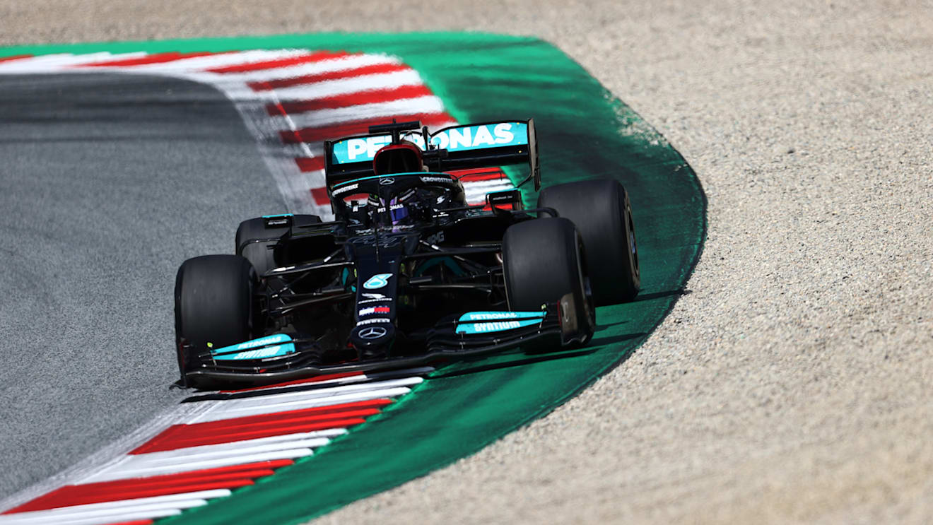 SPIELBERG, AUSTRIA - JUNE 27: Lewis Hamilton of Great Britain driving the (44) Mercedes AMG Petronas F1 Team Mercedes W12 during the F1 Grand Prix of Styria at Red Bull Ring on June 27, 2021 in Spielberg, Austria. (Photo by Clive Rose/Getty Images)