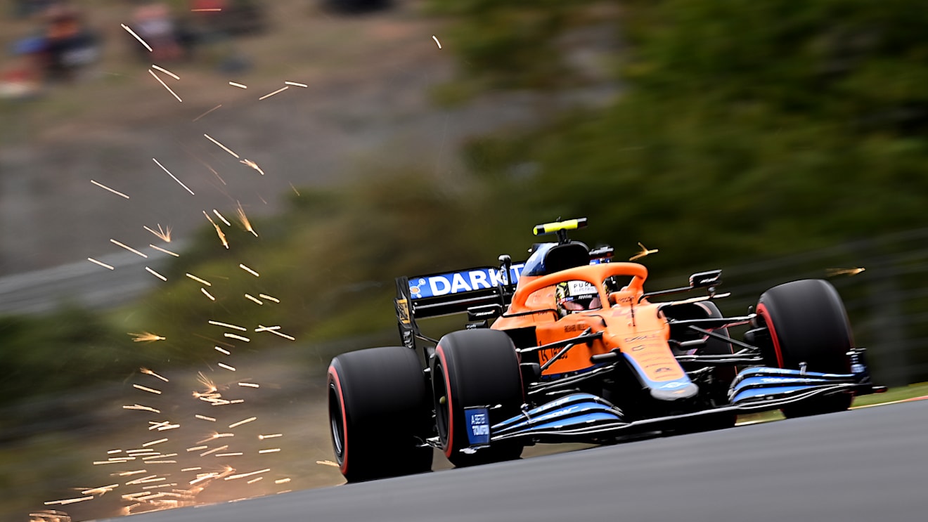 ISTANBUL, TURKEY - OCTOBER 09: Sparks fly behind Lando Norris of Great Britain driving the (4) McLaren F1 Team MCL35M Mercedes during qualifying ahead of the F1 Grand Prix of Turkey at Intercity Istanbul Park on October 09, 2021 in Istanbul, Turkey. (Photo by Clive Mason - Formula 1/Formula 1 via Getty Images)