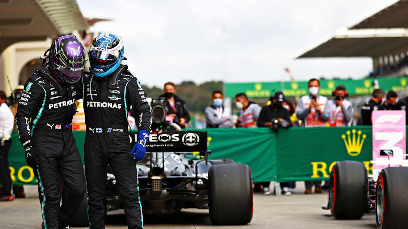 ISTANBUL, TURKEY - OCTOBER 09: Pole position qualifier Lewis Hamilton of Great Britain and Mercedes GP and second place qualifier Valtteri Bottas of Finland and Mercedes GP celebrate in parc ferme during qualifying ahead of the F1 Grand Prix of Turkey at Intercity Istanbul Park on October 09, 2021 in Istanbul, Turkey. (Photo by Dan Istitene - Formula 1/Formula 1 via Getty Images)