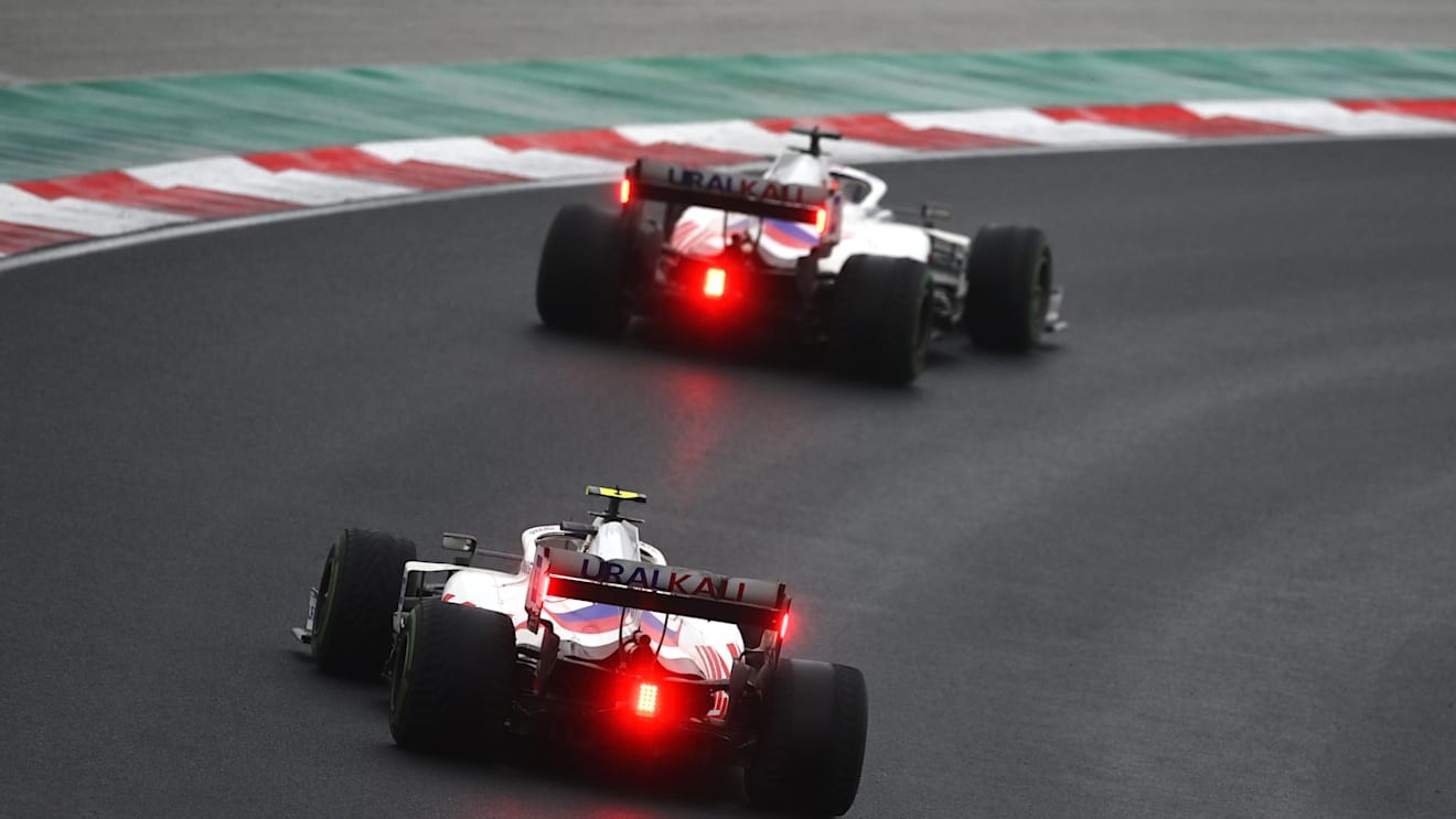 ISTANBUL, TURKEY - OCTOBER 10: Nikita Mazepin of Russia driving the (9) Haas F1 Team VF-21 Ferrari leads Mick Schumacher of Germany driving the (47) Haas F1 Team VF-21 Ferrari during the F1 Grand Prix of Turkey at Intercity Istanbul Park on October 10, 2021 in Istanbul, Turkey. (Photo by Dan Mullan/Getty Images)