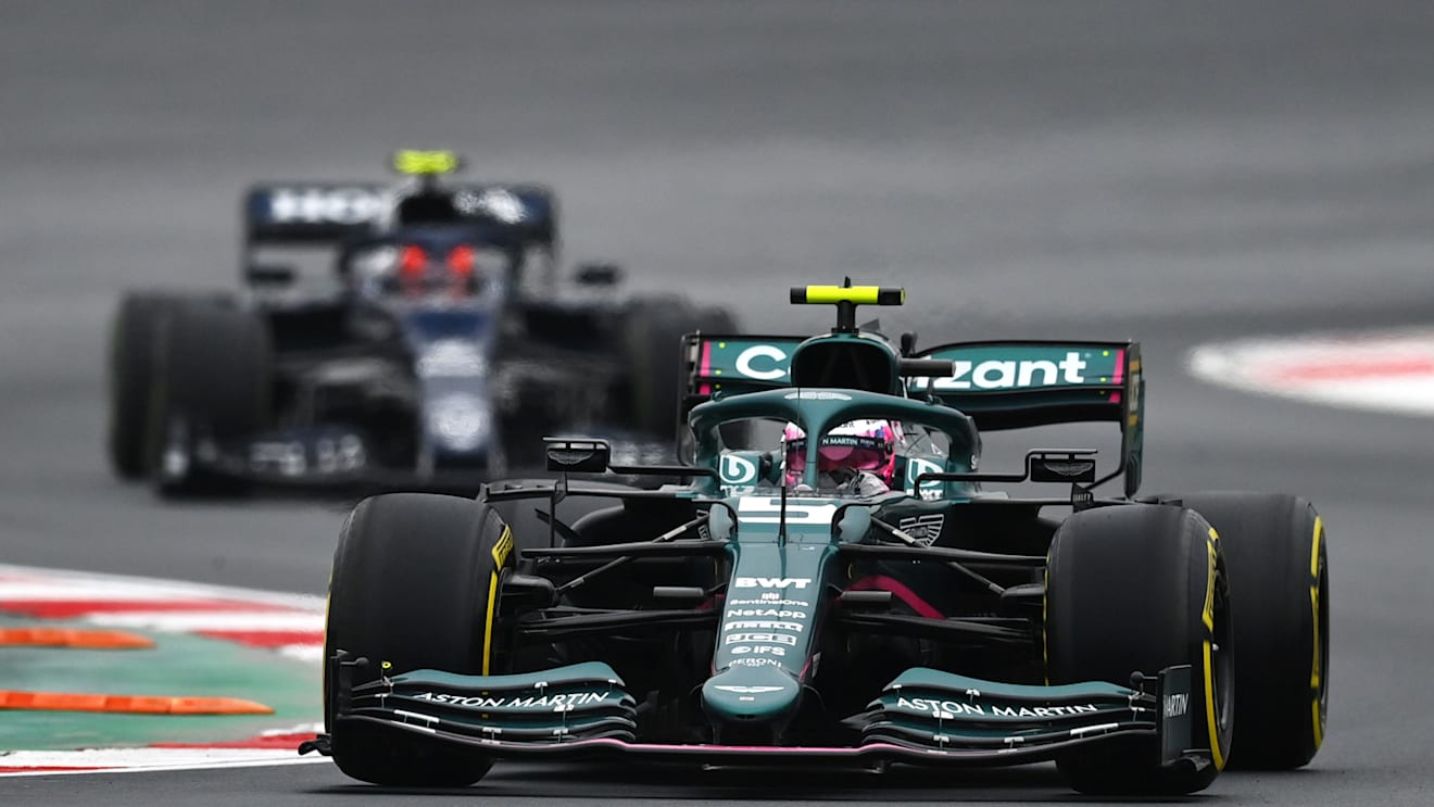 ISTANBUL, TURKEY - OCTOBER 10: Sebastian Vettel of Germany driving the (5) Aston Martin AMR21 Mercedes on slick tyres in the wet during the F1 Grand Prix of Turkey at Intercity Istanbul Park on October 10, 2021 in Istanbul, Turkey. (Photo by Dan Mullan/Getty Images)