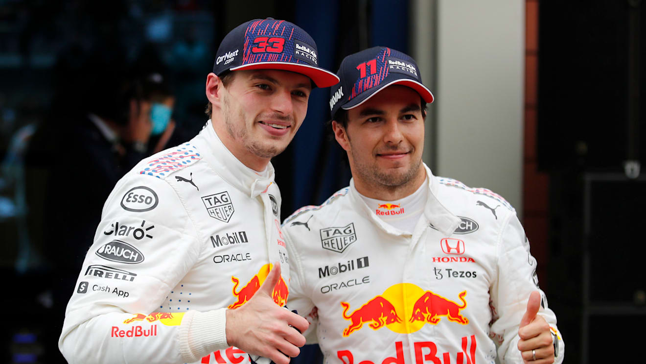 ISTANBUL, TURKEY - OCTOBER 10: Second placed Max Verstappen of Netherlands and Red Bull Racing and third placed Sergio Perez of Mexico and Red Bull Racing celebrate in parc ferme during the F1 Grand Prix of Turkey at Intercity Istanbul Park on October 10, 2021 in Istanbul, Turkey. (Photo by Umit Bektas - Pool/Getty Images)