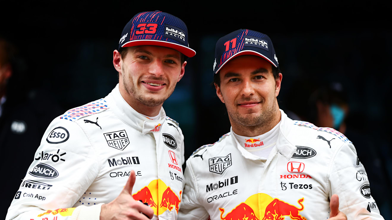ISTANBUL, TURKEY - OCTOBER 10: Second placed Max Verstappen of Netherlands and Red Bull Racing and third placed Sergio Perez of Mexico and Red Bull Racing celebrate in parc ferme during the F1 Grand Prix of Turkey at Intercity Istanbul Park on October 10, 2021 in Istanbul, Turkey. (Photo by Mark Thompson/Getty Images)