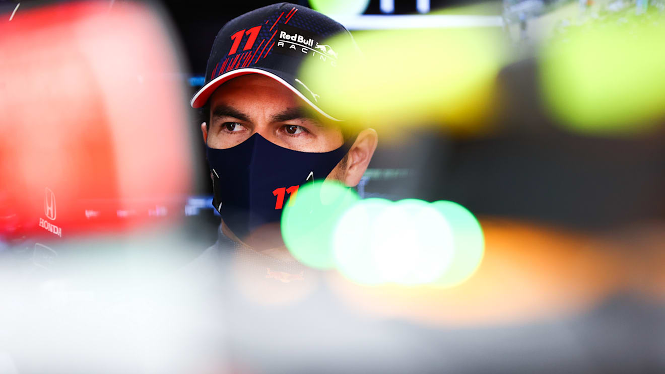AUSTIN, TEXAS - OCTOBER 22: Sergio Perez of Mexico and Red Bull Racing prepares to drive in the garage during practice ahead of the F1 Grand Prix of USA at Circuit of The Americas on October 22, 2021 in Austin, Texas. (Photo by Mark Thompson/Getty Images)