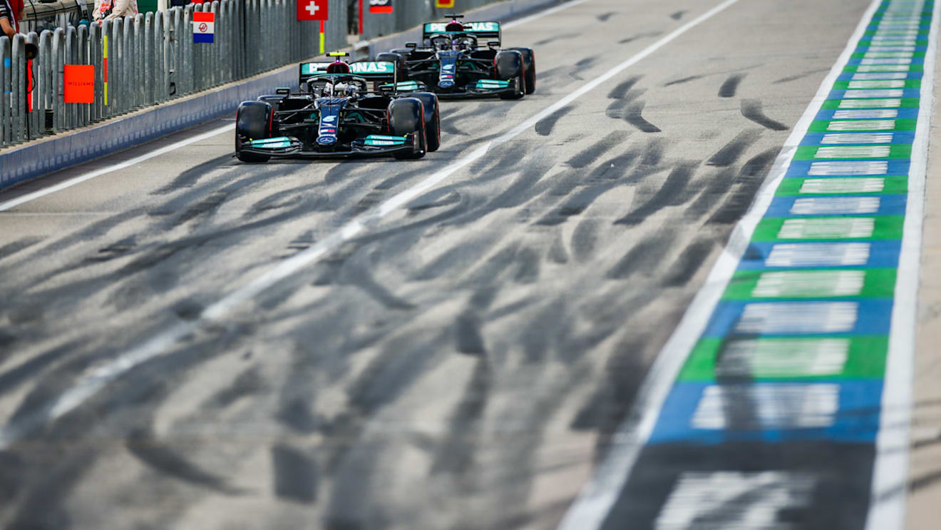AUSTIN, TEXAS - OCTOBER 23: Valterri Bottas of Mercedes and Finland and Lewis Hamilton of Mercedes and Great Britain  during qualifying ahead of the F1 Grand Prix of USA at Circuit of The Americas on October 23, 2021 in Austin, Texas. (Photo by Peter Fox/Getty Images)