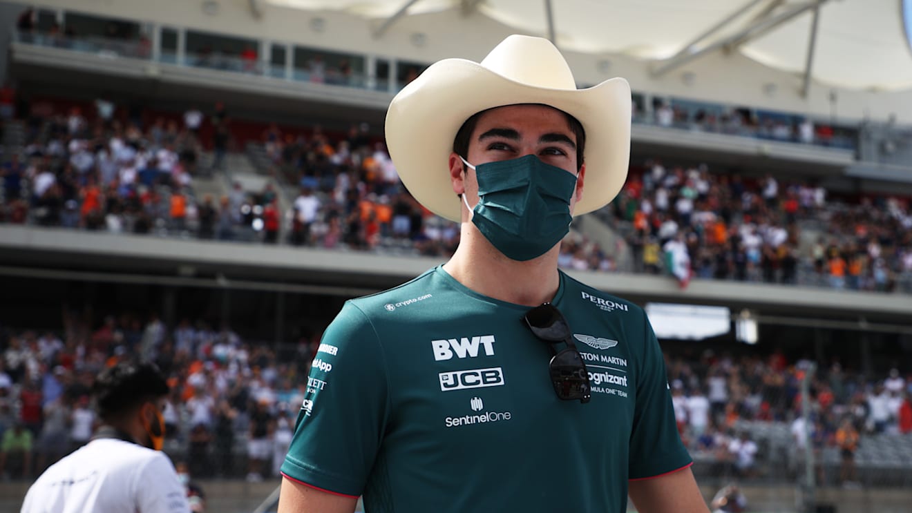 AUSTIN, TEXAS - OCTOBER 24: Lance Stroll of Canada and Aston Martin F1 Team walks in the Paddock before the F1 Grand Prix of USA at Circuit of The Americas on October 24, 2021 in Austin, Texas. (Photo by Chris Graythen/Getty Images)