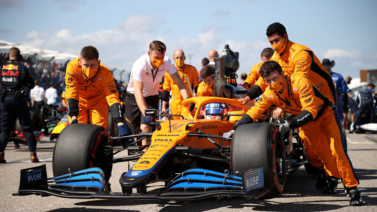 AUSTIN, TEXAS - OCTOBER 24: Lando Norris of Great Britain and McLaren F1 prepares to drive on the grid during the F1 Grand Prix of USA at Circuit of The Americas on October 24, 2021 in Austin, Texas. (Photo by Chris Graythen/Getty Images)