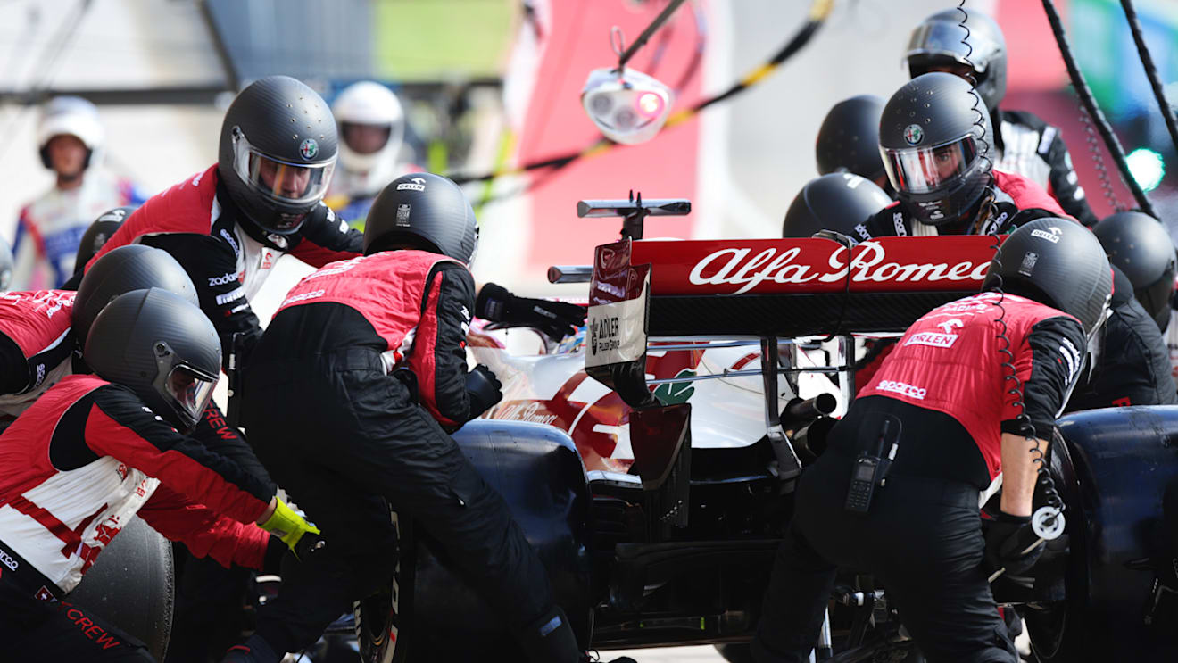 AUSTIN, TEXAS - OCTOBER 24: Kimi Raikkonen of Finland driving the (7) Alfa Romeo Racing C41 Ferrari makes a pitstop during the F1 Grand Prix of USA at Circuit of The Americas on October 24, 2021 in Austin, Texas. (Photo by Peter Fox/Getty Images)