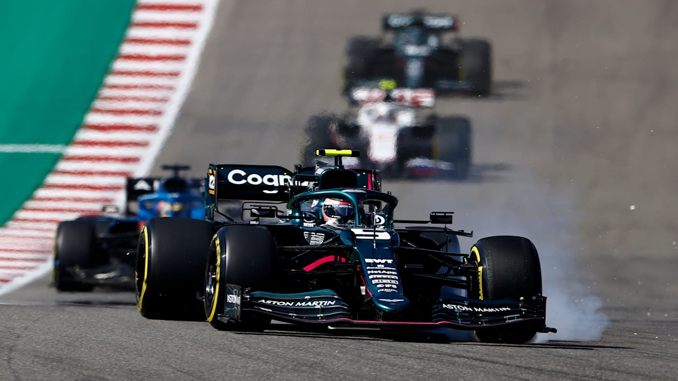 AUSTIN, TEXAS - OCTOBER 24: Sebastian Vettel of Germany driving the (5) Aston Martin AMR21 Mercedes locks a wheel under braking during the F1 Grand Prix of USA at Circuit of The Americas on October 24, 2021 in Austin, Texas. (Photo by Jared C. Tilton/Getty Images)
