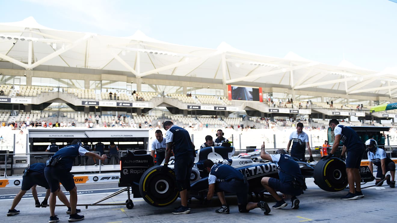 ABU DHABI, UNITED ARAB EMIRATES - NOVEMBER 18: Yuki Tsunoda of Japan driving the (22) Scuderia AlphaTauri AT03 in the pitlane during practice ahead of the F1 Grand Prix of Abu Dhabi at Yas Marina Circuit on November 18, 2022 in Abu Dhabi, United Arab Emirates. (Photo by Rudy Carezzevoli/Getty Images)