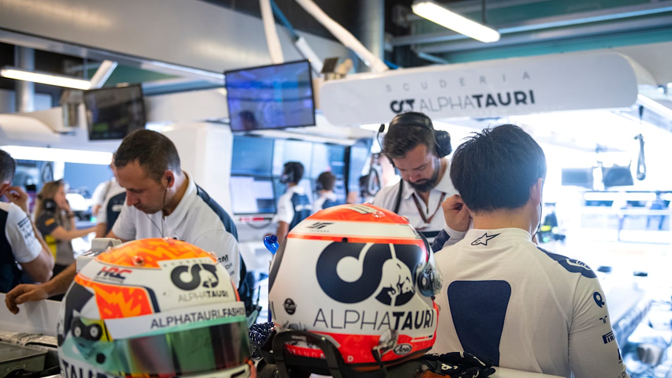 ABU DHABI, UNITED ARAB EMIRATES - NOVEMBER 18: Yuki Tsunoda of Japan and Scuderia AlphaTauri prepares to drive in the garage during practice ahead of the F1 Grand Prix of Abu Dhabi at Yas Marina Circuit on November 18, 2022 in Abu Dhabi, United Arab Emirates. (Photo by Rudy Carezzevoli/Getty Images)