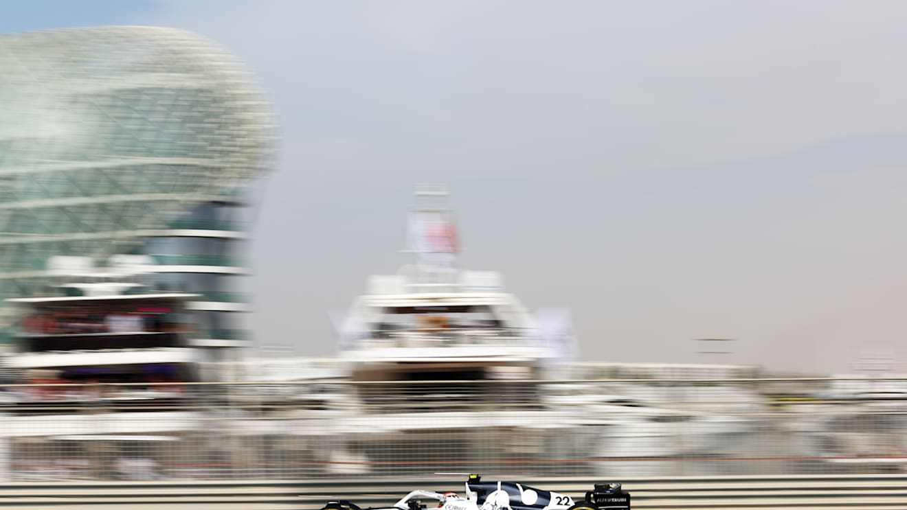 ABU DHABI, UNITED ARAB EMIRATES - NOVEMBER 18: Yuki Tsunoda of Japan driving the (22) Scuderia AlphaTauri AT03 in the Pitlane during practice ahead of the F1 Grand Prix of Abu Dhabi at Yas Marina Circuit on November 18, 2022 in Abu Dhabi, United Arab Emirates. (Photo by Bryn Lennon - Formula 1/Formula 1 via Getty Images)