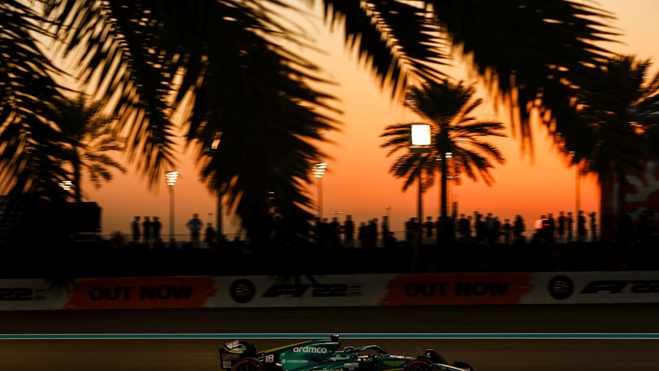 ABU DHABI, UNITED ARAB EMIRATES - NOVEMBER 18: Lance Stroll of Canada driving the (18) Aston Martin AMR22 Mercedes on track during practice ahead of the F1 Grand Prix of Abu Dhabi at Yas Marina Circuit on November 18, 2022 in Abu Dhabi, United Arab Emirates. (Photo by Mark Thompson/Getty Images)