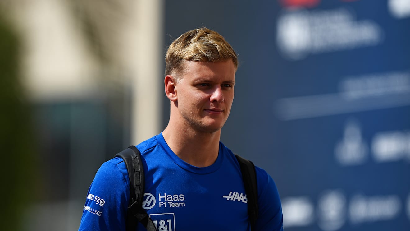 ABU DHABI, UNITED ARAB EMIRATES - NOVEMBER 19: Mick Schumacher of Germany and Haas F1 walks in the paddock during final practice ahead of the F1 Grand Prix of Abu Dhabi at Yas Marina Circuit on November 19, 2022 in Abu Dhabi, United Arab Emirates. (Photo by Rudy Carezzevoli/Getty Images)