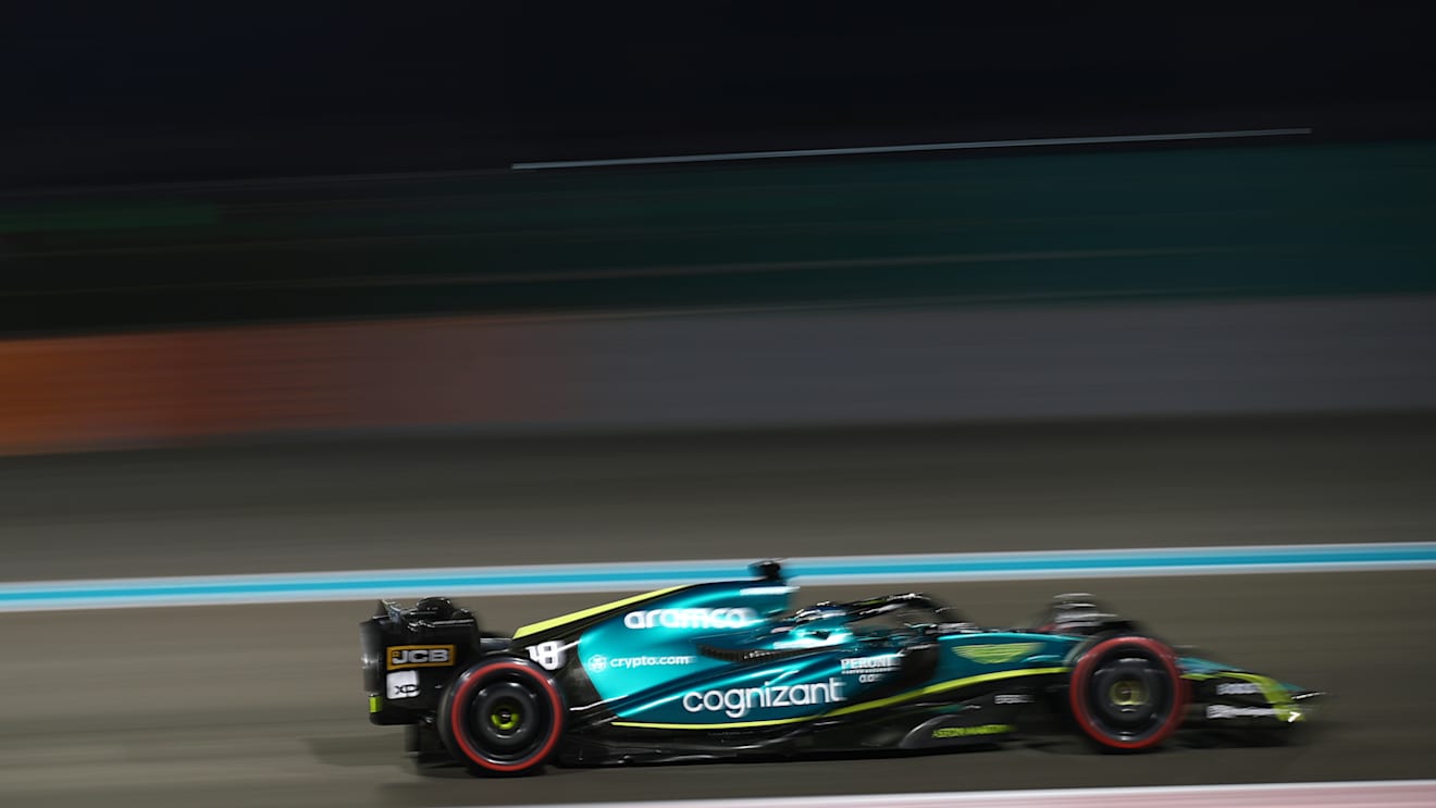 ABU DHABI, UNITED ARAB EMIRATES - NOVEMBER 19: Lance Stroll of Canada driving the (18) Aston Martin AMR22 Mercedes on track during qualifying ahead of the F1 Grand Prix of Abu Dhabi at Yas Marina Circuit on November 19, 2022 in Abu Dhabi, United Arab Emirates. (Photo by Joe Portlock - Formula 1/Formula 1 via Getty Images)