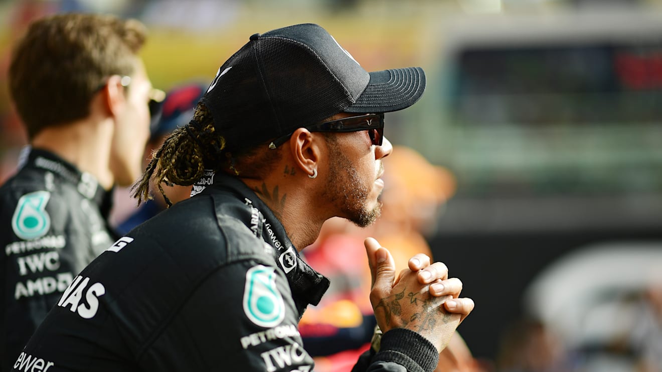 ABU DHABI, UNITED ARAB EMIRATES - NOVEMBER 20: Lewis Hamilton of Great Britain and Mercedes looks on ahead of the F1 2022 End of Year photo prior to the F1 Grand Prix of Abu Dhabi at Yas Marina Circuit on November 20, 2022 in Abu Dhabi, United Arab Emirates. (Photo by Mario Renzi - Formula 1/Formula 1 via Getty Images)