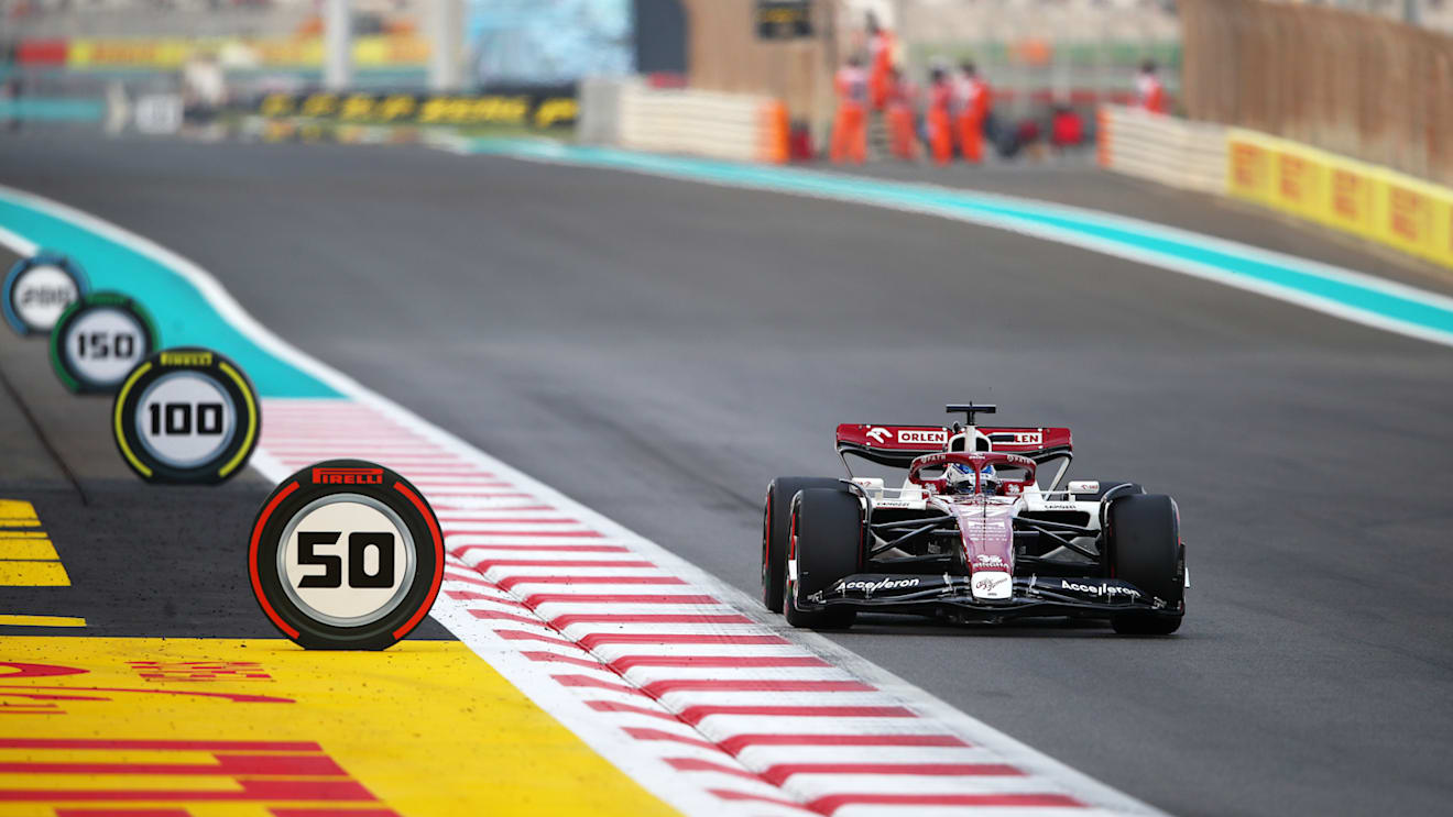 ABU DHABI, UNITED ARAB EMIRATES - NOVEMBER 20: Valtteri Bottas of Finland driving the (77) Alfa Romeo F1 C42 Ferrari on their way to the grid prior to the F1 Grand Prix of Abu Dhabi at Yas Marina Circuit on November 20, 2022 in Abu Dhabi, United Arab Emirates. (Photo by Joe Portlock - Formula 1/Formula 1 via Getty Images)