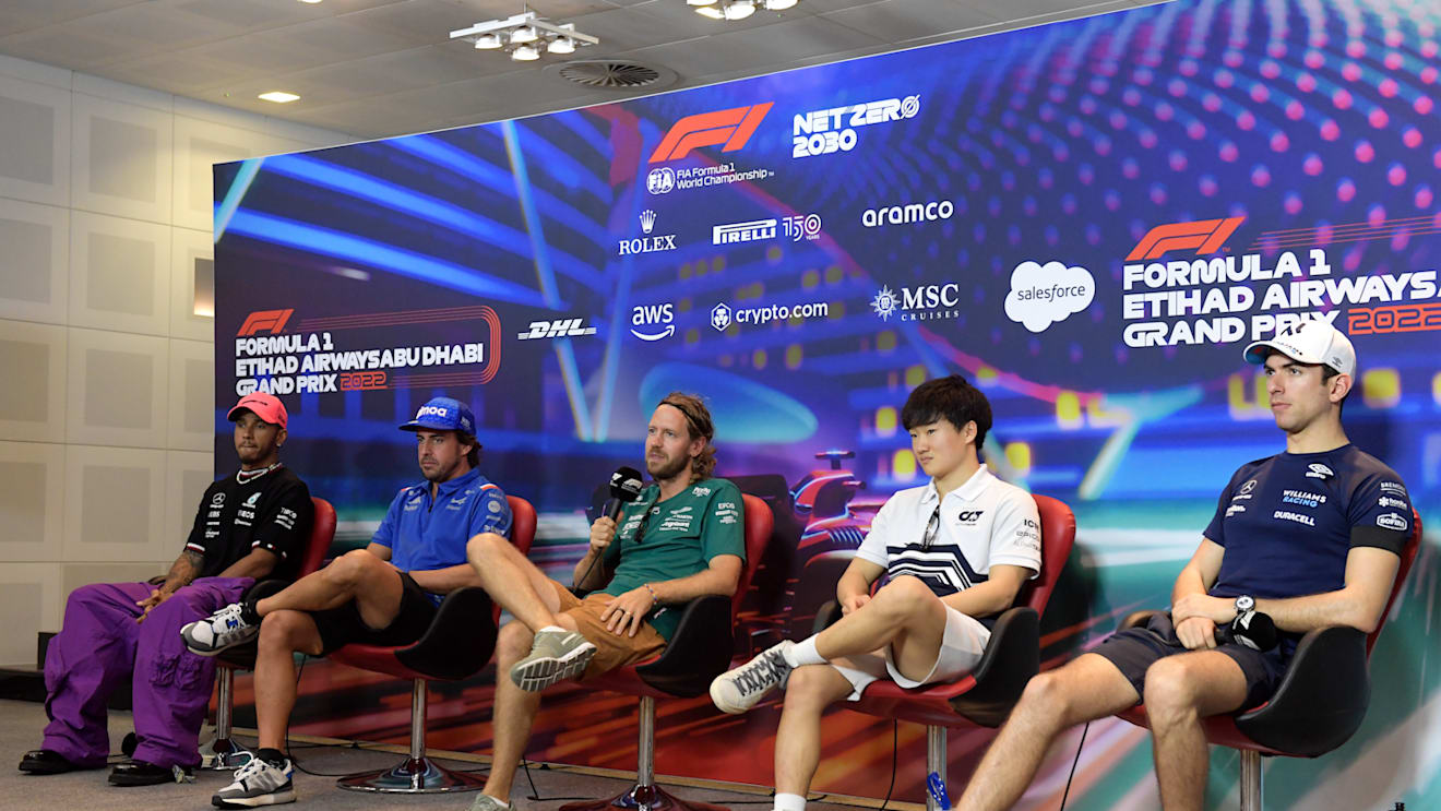 ABU DHABI, UNITED ARAB EMIRATES - NOVEMBER 17: Lewis Hamilton of Great Britain and Mercedes, Fernando Alonso of Spain and Alpine F1, Sebastian Vettel of Germany and Aston Martin F1 Team, Yuki Tsunoda of Japan and Scuderia AlphaTauri and Nicholas Latifi of Canada and Williams talk in a press conference during previews ahead of the F1 Grand Prix of Abu Dhabi at Yas Marina Circuit on November 17, 2022 in Abu Dhabi, United Arab Emirates. (Photo by Rudy Carezzevoli/Getty Images)