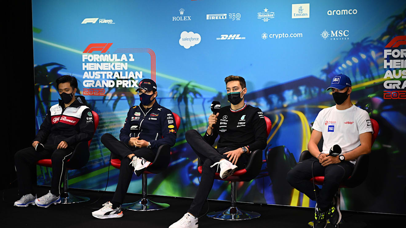 MELBOURNE, AUSTRALIA - APRIL 08: (L-R) Zhou Guanyu of China and Alfa Romeo F1, Sergio Perez of Mexico and Oracle Red Bull Racing, George Russell of Great Britain and Mercedes and Mick Schumacher of Germany and Haas F1 attend the Drivers Press Conference prior to practice ahead of the F1 Grand Prix of Australia at Melbourne Grand Prix Circuit on April 08, 2022 in Melbourne, Australia. (Photo by Clive Mason/Getty Images)