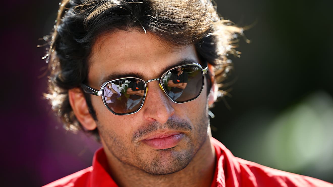MELBOURNE, AUSTRALIA - APRIL 08: Carlos Sainz of Spain and Ferrari looks on in the Paddock prior to practice ahead of the F1 Grand Prix of Australia at Melbourne Grand Prix Circuit on April 08, 2022 in Melbourne, Australia. (Photo by Clive Mason/Getty Images)