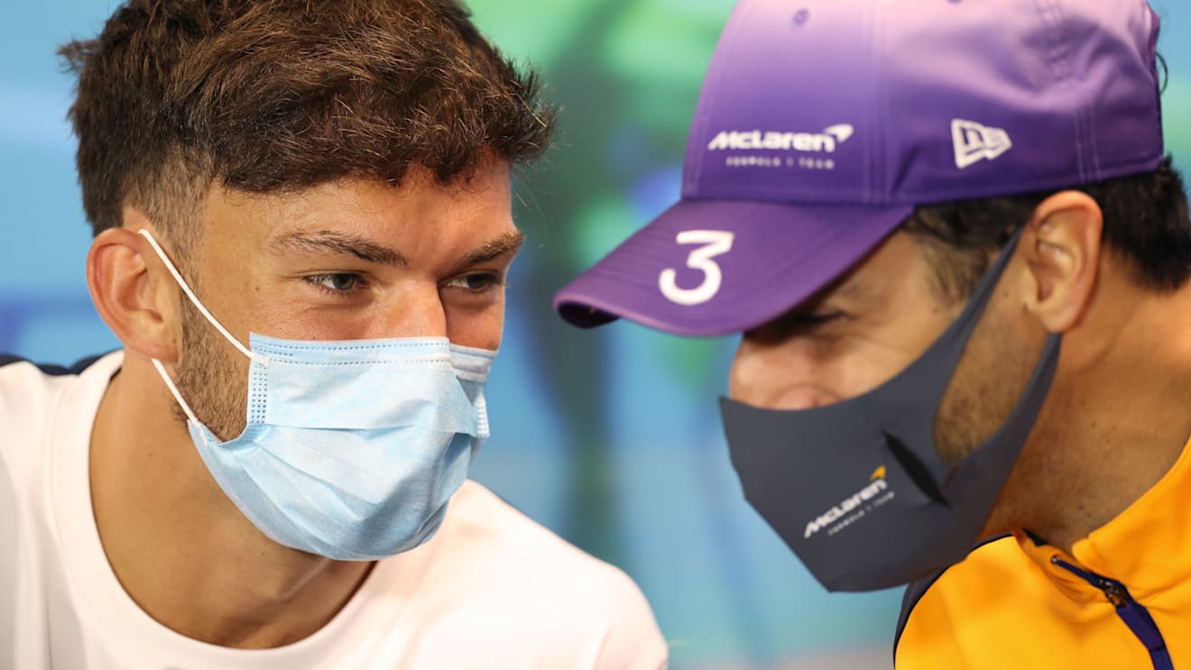 MELBOURNE, AUSTRALIA - APRIL 08: Pierre Gasly of France and Scuderia AlphaTauri and Daniel Ricciardo of Australia and McLaren talk in the Drivers Press Conference prior to practice ahead of the F1 Grand Prix of Australia at Melbourne Grand Prix Circuit on April 08, 2022 in Melbourne, Australia. (Photo by Robert Cianflone/Getty Images)