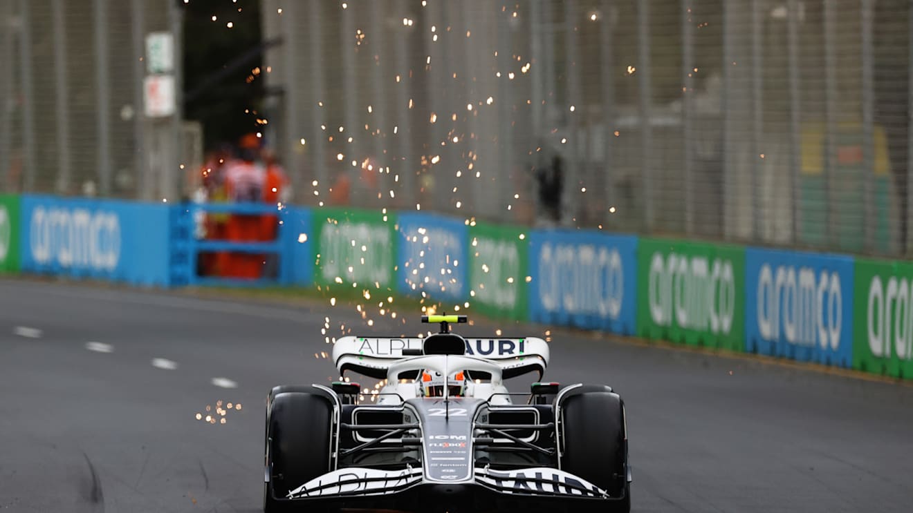 MELBOURNE, AUSTRALIA - APRIL 08: Sparks fly behind Yuki Tsunoda of Japan driving the (22) Scuderia AlphaTauri AT03 on track during practice ahead of the F1 Grand Prix of Australia at Melbourne Grand Prix Circuit on April 08, 2022 in Melbourne, Australia. (Photo by Robert Cianflone/Getty Images)
