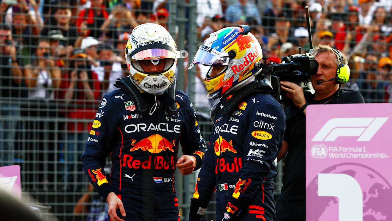 MELBOURNE, AUSTRALIA - APRIL 09: Second placed qualifier Max Verstappen of the Netherlands and Oracle Red Bull Racing and Third placed qualifier Sergio Perez of Mexico and Oracle Red Bull Racing talk in parc ferme during qualifying ahead of the F1 Grand Prix of Australia at Melbourne Grand Prix Circuit on April 09, 2022 in Melbourne, Australia. (Photo by Mark Thompson/Getty Images)