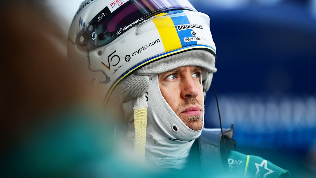 MELBOURNE, AUSTRALIA - APRIL 09: Sebastian Vettel of Germany and Aston Martin F1 Team looks on in the garage during qualifying ahead of the F1 Grand Prix of Australia at Melbourne Grand Prix Circuit on April 09, 2022 in Melbourne, Australia. (Photo by Mario Renzi - Formula 1/Formula 1 via Getty Images)