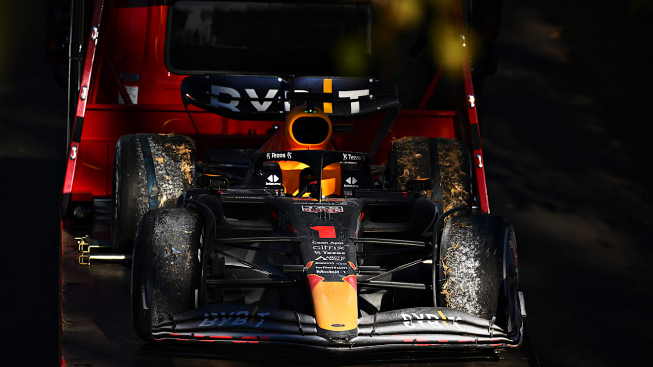MELBOURNE, AUSTRALIA - APRIL 10: The car of Max Verstappen of the Netherlands and Oracle Red Bull Racing is recovered to the garage after he retired from the race during the F1 Grand Prix of Australia at Melbourne Grand Prix Circuit on April 10, 2022 in Melbourne, Australia. (Photo by Clive Mason/Getty Images)
