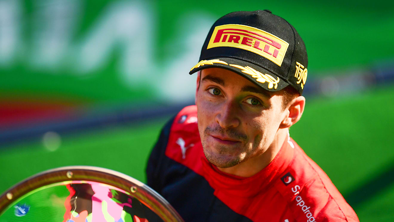 MELBOURNE, AUSTRALIA - APRIL 10: Race winner Charles Leclerc of Monaco and Ferrari celebrates on the podium during the F1 Grand Prix of Australia at Melbourne Grand Prix Circuit on April 10, 2022 in Melbourne, Australia. (Photo by Mario Renzi - Formula 1/Formula 1 via Getty Images)