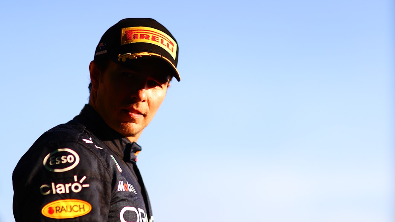 MELBOURNE, AUSTRALIA - APRIL 10: Second placed Sergio Perez of Mexico and Oracle Red Bull Racing celebrates on the podium during the F1 Grand Prix of Australia at Melbourne Grand Prix Circuit on April 10, 2022 in Melbourne, Australia. (Photo by Dan Istitene - Formula 1/Formula 1 via Getty Images)