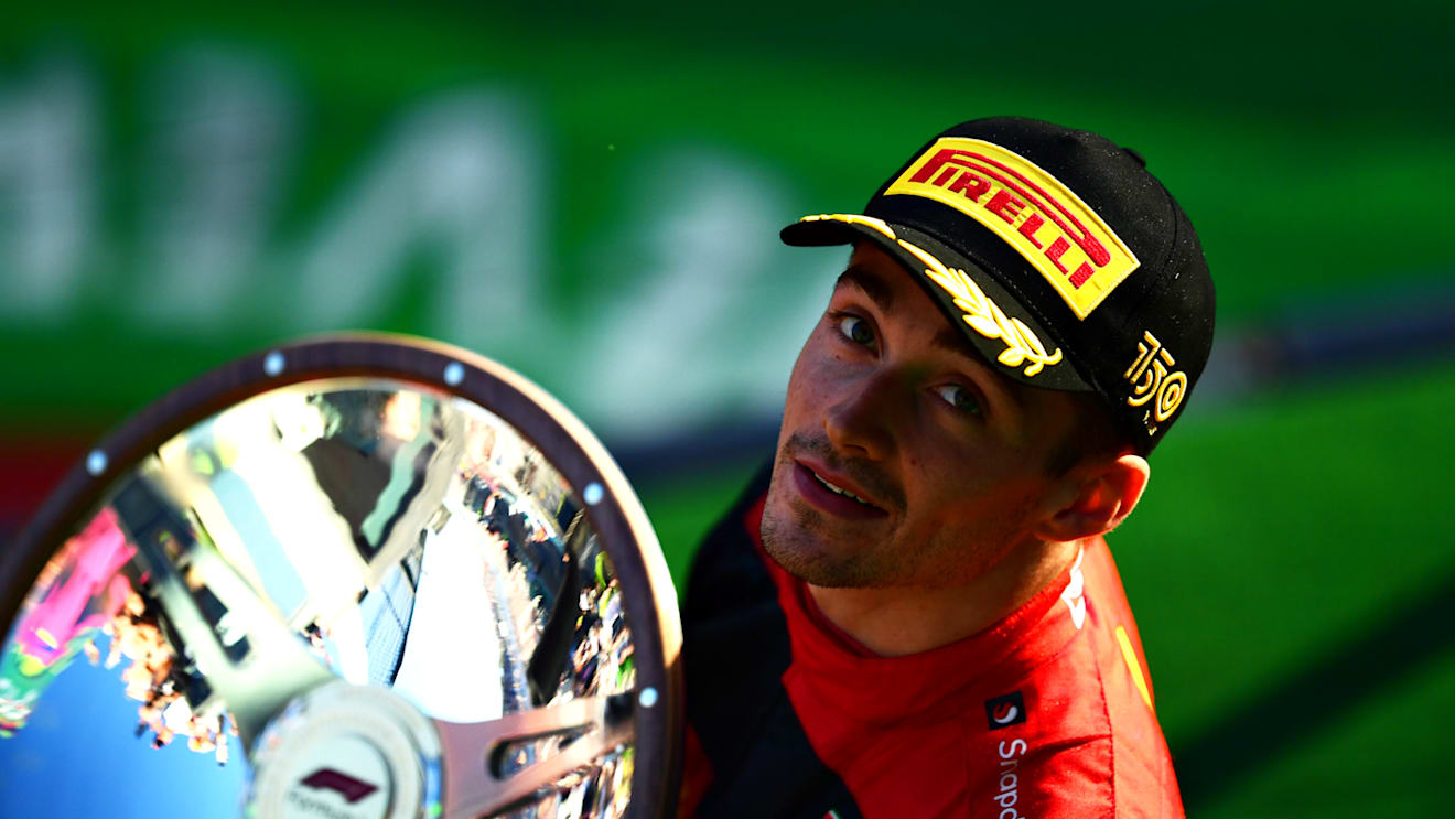 MELBOURNE, AUSTRALIA - APRIL 10: Race winner Charles Leclerc of Monaco and Ferrari celebrates on the podium during the F1 Grand Prix of Australia at Melbourne Grand Prix Circuit on April 10, 2022 in Melbourne, Australia. (Photo by Mario Renzi - Formula 1/Formula 1 via Getty Images)