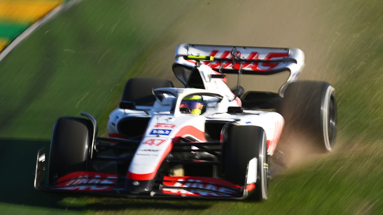 MELBOURNE, AUSTRALIA - APRIL 10: Mick Schumacher of Germany driving the (47) Haas F1 VF-22 Ferrari runs wide during the F1 Grand Prix of Australia at Melbourne Grand Prix Circuit on April 10, 2022 in Melbourne, Australia. (Photo by Clive Mason/Getty Images)