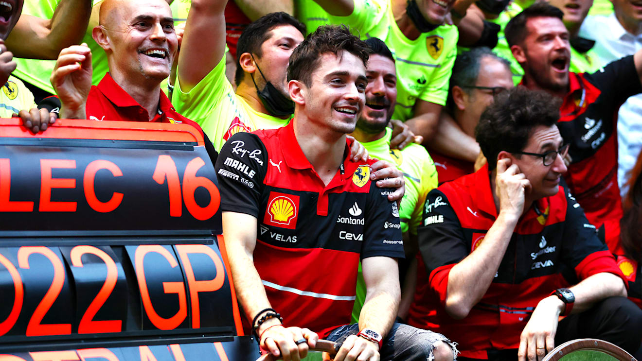 MELBOURNE, AUSTRALIA - APRIL 10: Race winner Charles Leclerc of Monaco and Ferrari celebrates with his team after the F1 Grand Prix of Australia at Melbourne Grand Prix Circuit on April 10, 2022 in Melbourne, Australia. (Photo by Bryn Lennon - Formula 1/Formula 1 via Getty Images)