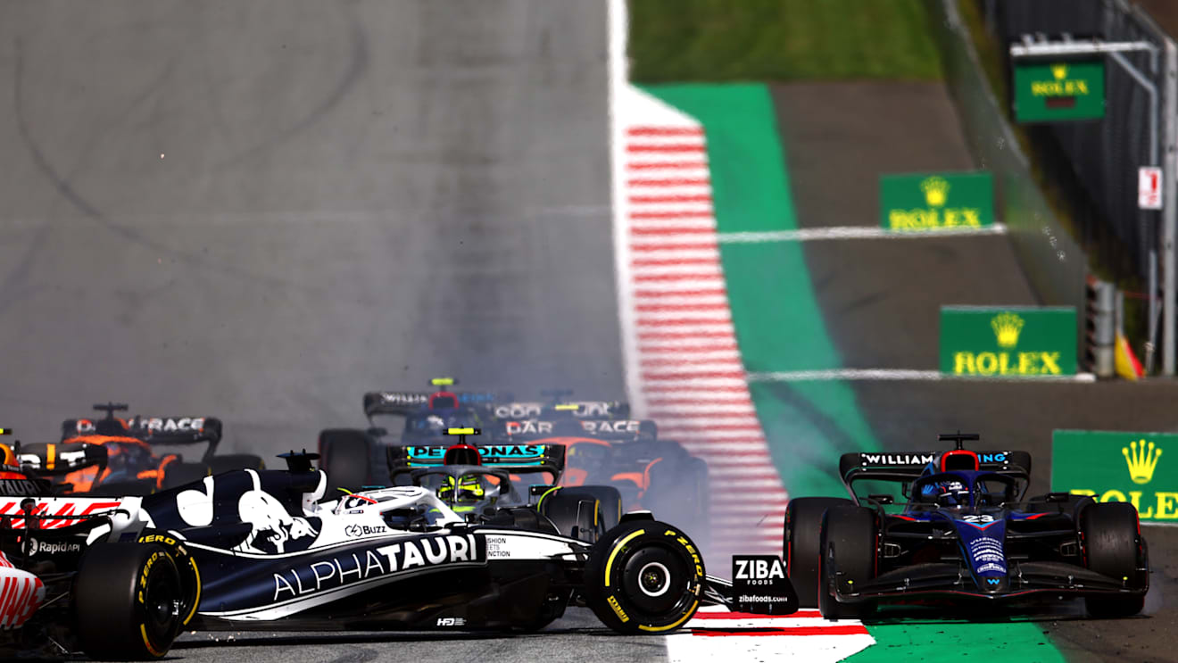 SPIELBERG, AUSTRIA - JULY 09: Pierre Gasly of France driving the (10) Scuderia AlphaTauri AT03 spins at the start during the F1 Grand Prix of Austria Sprint at Red Bull Ring on July 09, 2022 in Spielberg, Austria. (Photo by Bryn Lennon/Getty Images)