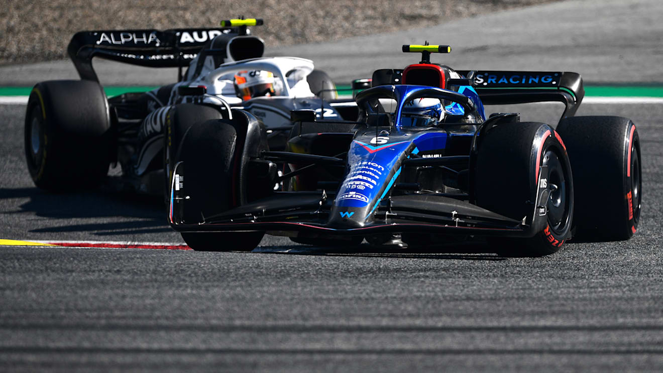 SPIELBERG, AUSTRIA - JULY 09: Nicholas Latifi of Canada driving the (6) Williams FW44 Mercedes leads Yuki Tsunoda of Japan driving the (22) Scuderia AlphaTauri AT03 during the F1 Grand Prix of Austria Sprint at Red Bull Ring on July 09, 2022 in Spielberg, Austria. (Photo by Rudy Carezzevoli - Formula 1/Formula 1 via Getty Images)