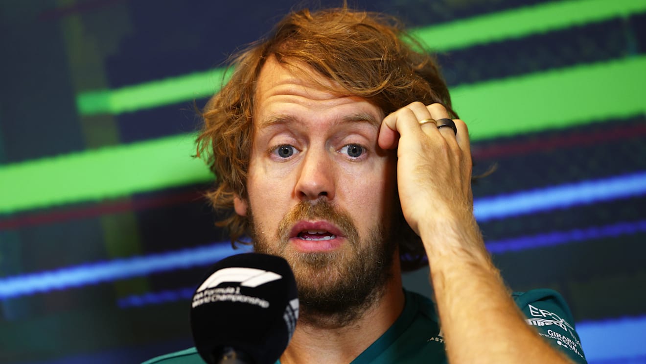 BAKU, AZERBAIJAN - JUNE 10: Sebastian Vettel of Germany and Aston Martin F1 Team talks in the Drivers Press Conference prior to practice ahead of the F1 Grand Prix of Azerbaijan at Baku City Circuit on June 10, 2022 in Baku, Azerbaijan. (Photo by Clive Rose/Getty Images)
