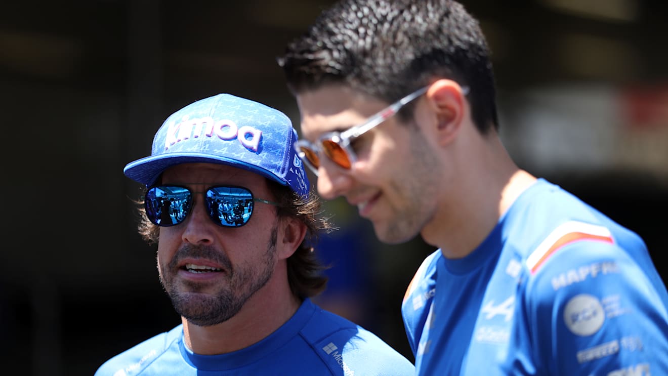 BAKU, AZERBAIJAN - JUNE 12: Fernando Alonso of Spain and Alpine F1 and Esteban Ocon of France and Alpine F1 talk to the media ahead of the F1 Grand Prix of Azerbaijan at Baku City Circuit on June 12, 2022 in Baku, Azerbaijan. (Photo by Bryn Lennon - Formula 1/Formula 1 via Getty Images)