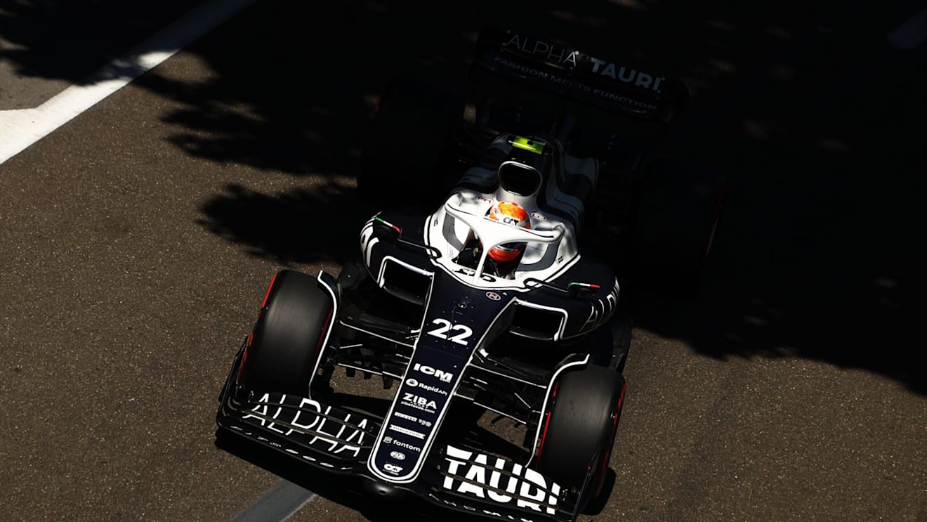 BAKU, AZERBAIJAN - JUNE 12: Yuki Tsunoda of Japan driving the (22) Scuderia AlphaTauri AT03 on his way to the grid ahead of the F1 Grand Prix of Azerbaijan at Baku City Circuit on June 12, 2022 in Baku, Azerbaijan. (Photo by Clive Rose/Getty Images)