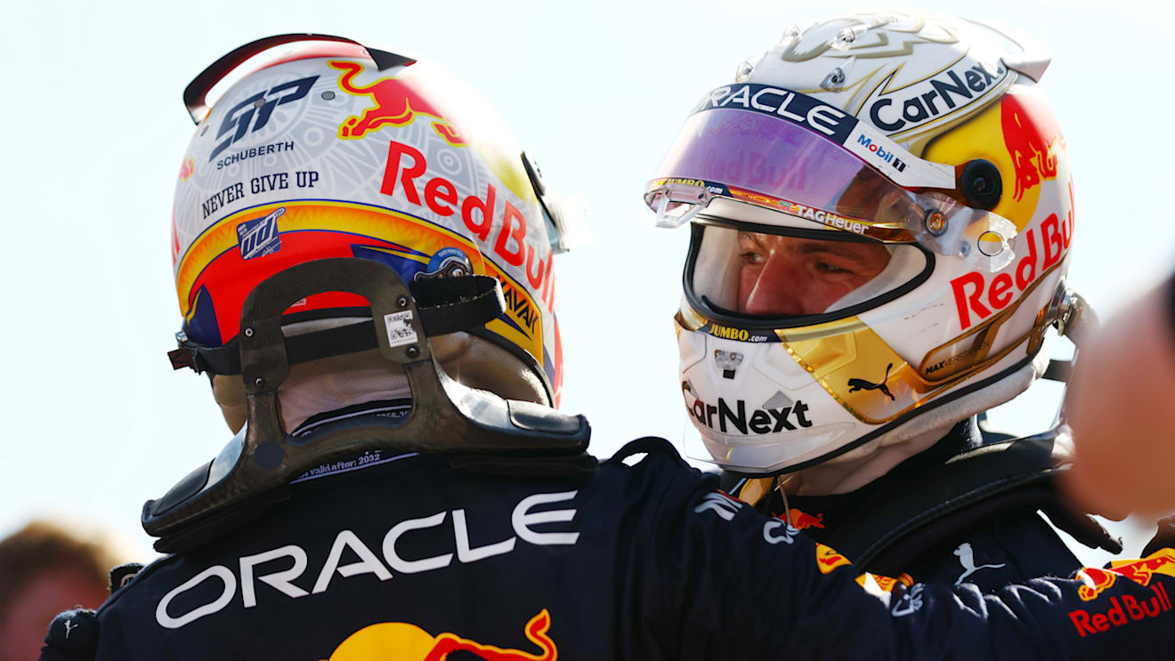 BAKU, AZERBAIJAN - JUNE 12: Race winner Max Verstappen of the Netherlands and Oracle Red Bull Racing and Second placed Sergio Perez of Mexico and Oracle Red Bull Racing celebrate in parc ferme during the F1 Grand Prix of Azerbaijan at Baku City Circuit on June 12, 2022 in Baku, Azerbaijan. (Photo by Dan Istitene - Formula 1/Formula 1 via Getty Images)