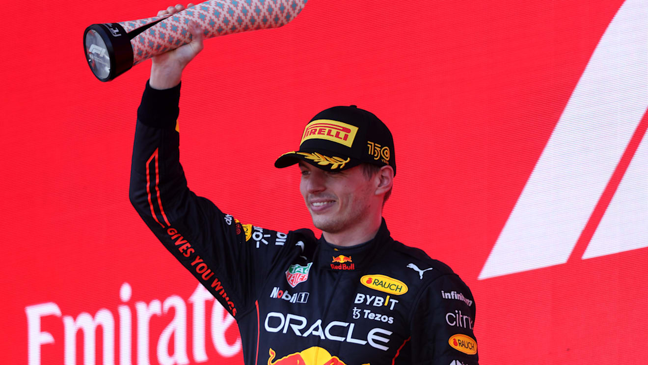 BAKU, AZERBAIJAN - JUNE 12: Race winner Max Verstappen of the Netherlands and Oracle Red Bull Racing celebrates on the podium during the F1 Grand Prix of Azerbaijan at Baku City Circuit on June 12, 2022 in Baku, Azerbaijan. (Photo by Bryn Lennon - Formula 1/Formula 1 via Getty Images)