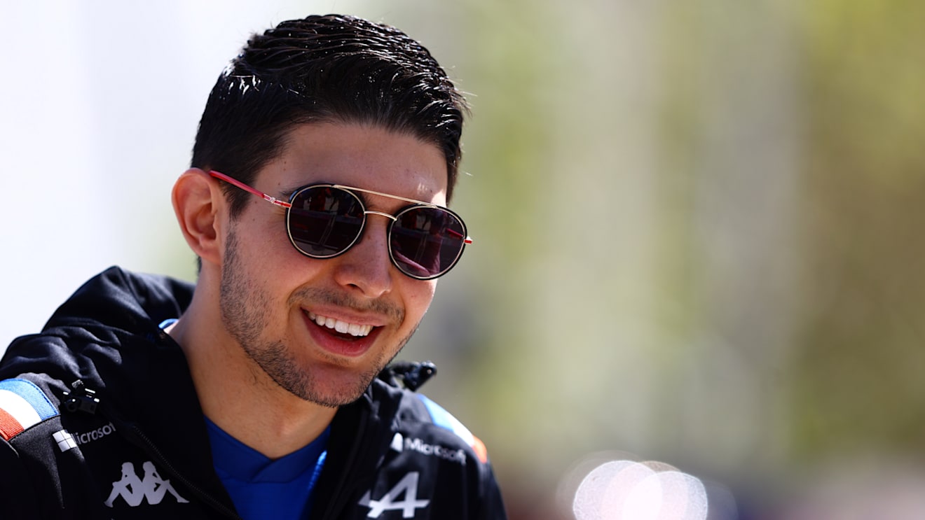 BAHRAIN, BAHRAIN - MARCH 18: Esteban Ocon of France and Alpine F1 looks on in the Paddock before practice ahead of the F1 Grand Prix of Bahrain at Bahrain International Circuit on March 18, 2022 in Bahrain, Bahrain. (Photo by Mark Thompson/Getty Images)