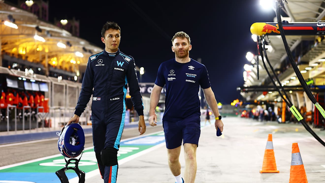 BAHRAIN, BAHRAIN - MARCH 19: Alexander Albon of Thailand and Williams walks in the Pitlane after qualifying in 14th position during qualifying ahead of the F1 Grand Prix of Bahrain at Bahrain International Circuit on March 19, 2022 in Bahrain, Bahrain. (Photo by Mark Thompson/Getty Images)