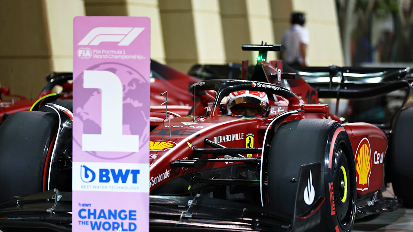 BAHRAIN, BAHRAIN - MARCH 19: Pole position qualifier Charles Leclerc of Monaco and Ferrari stops in parc ferme during qualifying ahead of the F1 Grand Prix of Bahrain at Bahrain International Circuit on March 19, 2022 in Bahrain, Bahrain. (Photo by Lars Baron/Getty Images)