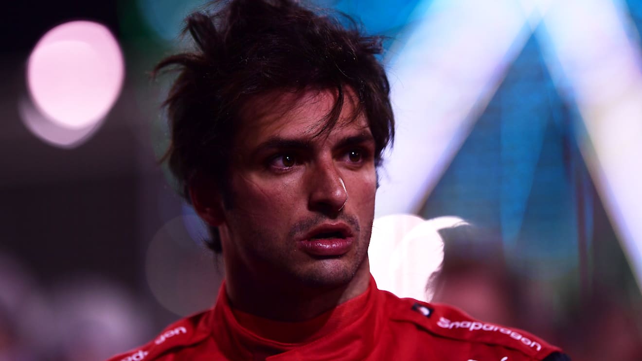 BAHRAIN, BAHRAIN - MARCH 19: Third place qualifier Carlos Sainz of Spain and Ferrari looks on in parc ferme during qualifying ahead of the F1 Grand Prix of Bahrain at Bahrain International Circuit on March 19, 2022 in Bahrain, Bahrain. (Photo by Mario Renzi - Formula 1/Formula 1 via Getty Images)